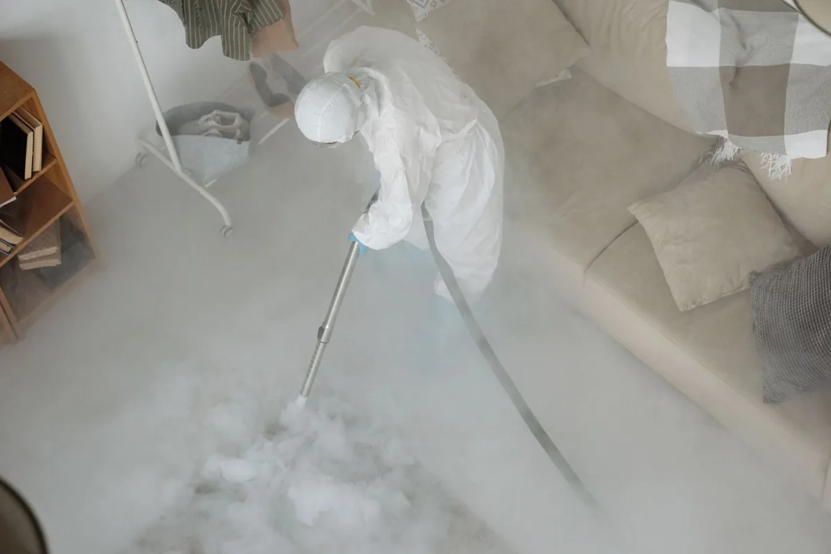 Biohazard cleanup technician in protective equipment, Broadview Heights, OH